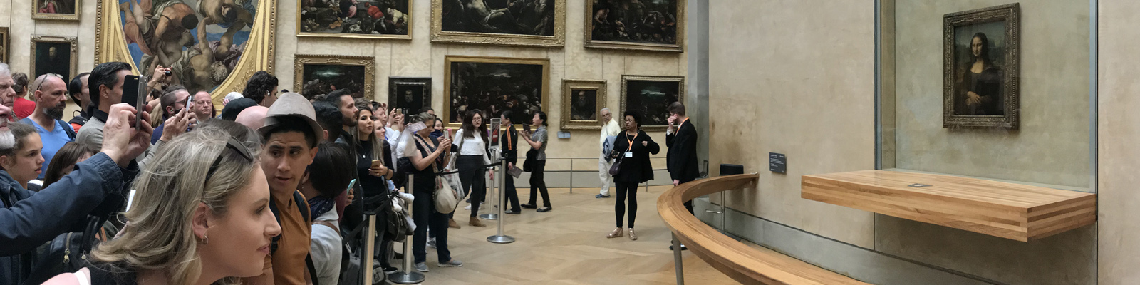 Tourists Crowding the Mona Lisa